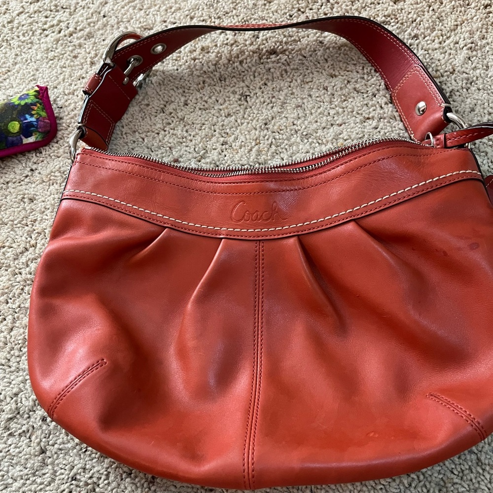 Burnt orange Coach bag in great condition for being a used bag